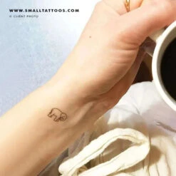 Baby Elephant (Right) Temporary Tattoo (Set Of 3) -Da Vinci Shop small elephant temporary tattoo client photo 700x e476cffc ef2a 4b8a a528 10f68b61650a